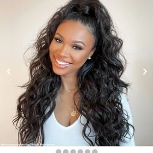 Brand new, never worn half up/half down 4 piece clip in. Black/brown highlights